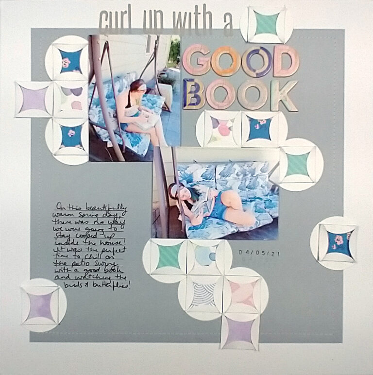 A scrapbook layout created with a cathedral window pattern.