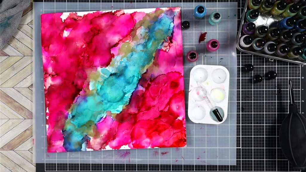 Two layers of alcohol ink color.