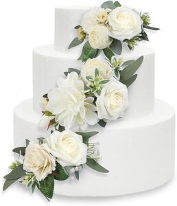 A wedding cake featuring flowers.