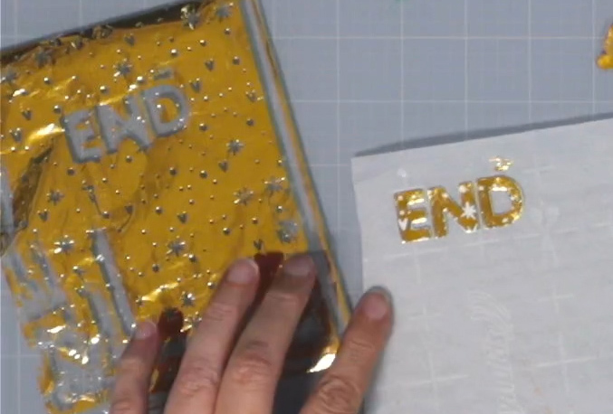 Title letters foiled with a pattern.