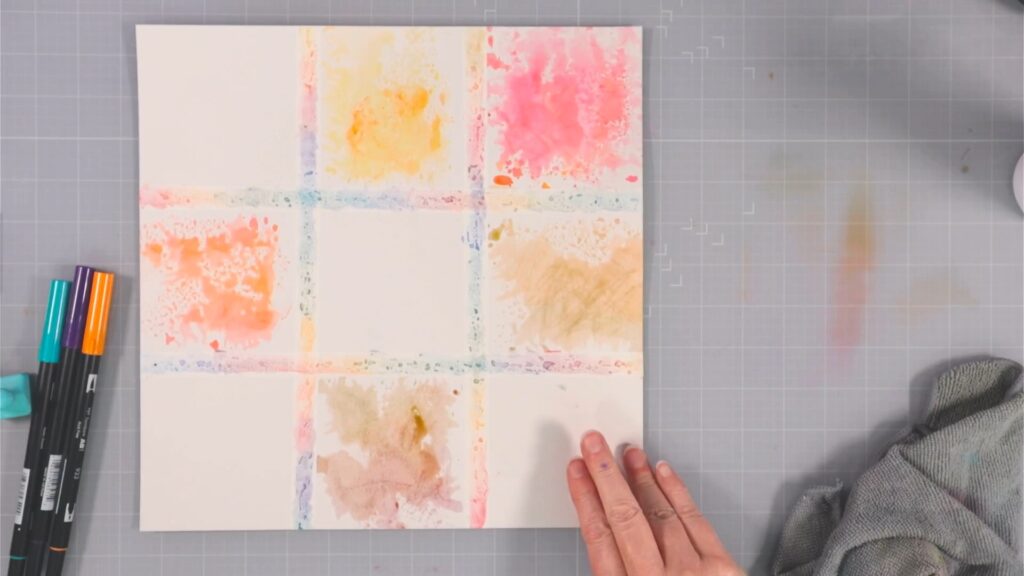 A mixed media base for a scrapbook layout